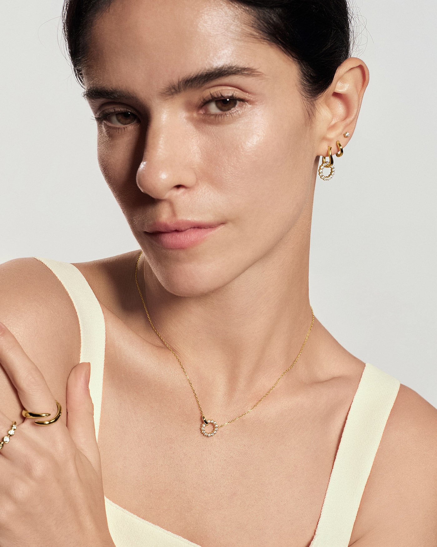 Model wearing Ania Haie Gold Interlinked Circles Pavé Necklace