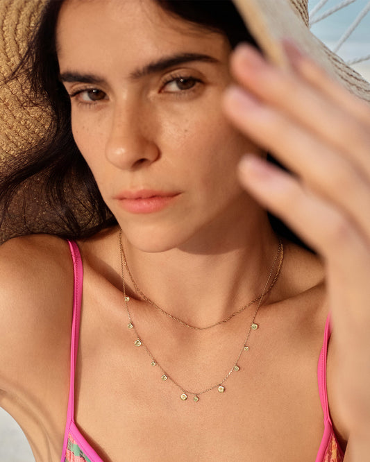 Ania Haie gold geometry mixed discs necklace worn on neck