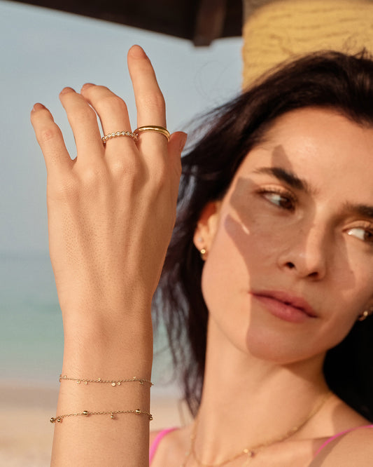 Ania Haie gold geometry mixed discs bracelet worn on wrist