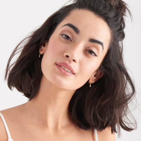 Gold Glow Huggie Hoops