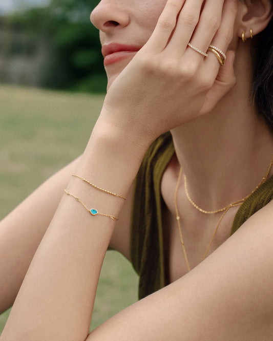 Ania Haie gold turquoise discs bracelet styled on wrist
