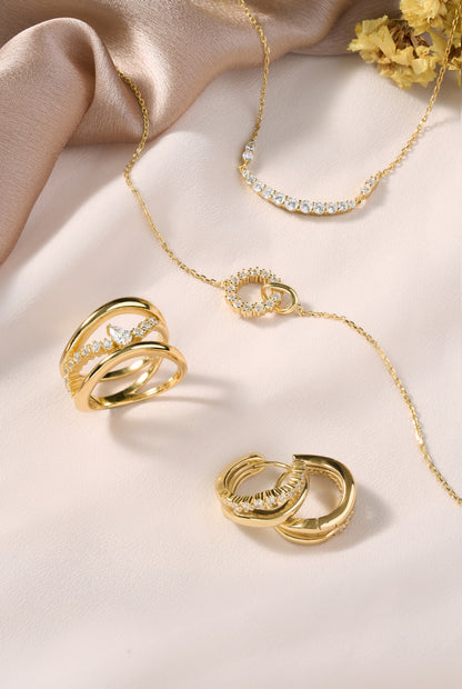 Gold Interlinked Circles Pavé Necklace styled with modern fashion accessories